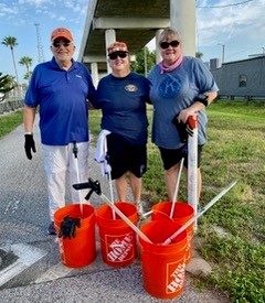 (L-R) Wayne, Leah and Leda cleaning up the trail.