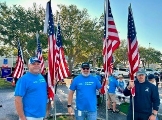 Duke Energy & USCG volunteers ready to install another flag.