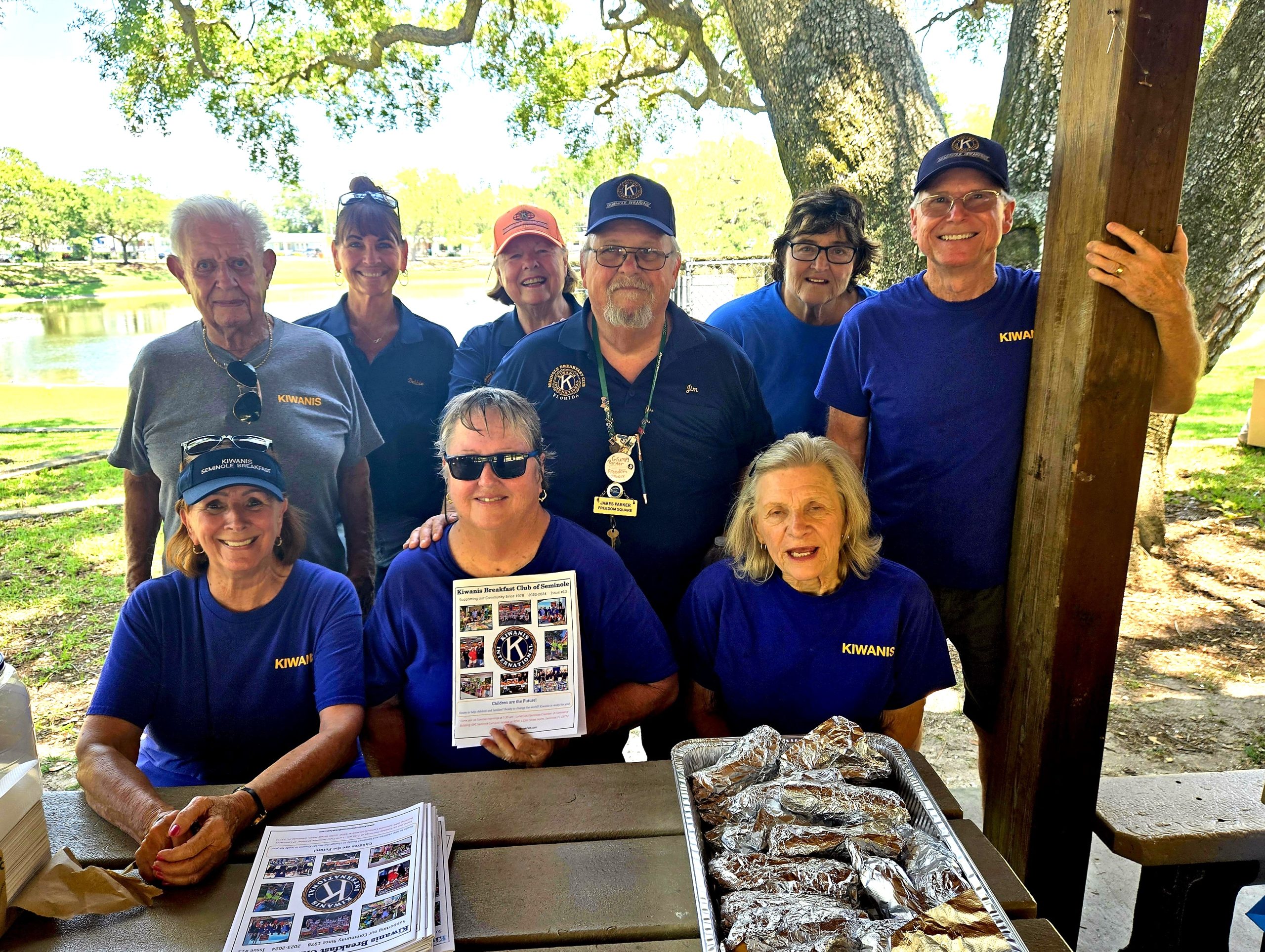 A great day providing hot dog, drinks, snacks and fun games at the 2024 Annual Seminole Kids Day Event. (L-R) Row 1 - Charlene, Leah, and Sandra. Row 2 - Dale, Debbie, Michele, Jim, Jackie, and David.